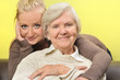 Senior woman with her granddaughter. Happy and smiling.