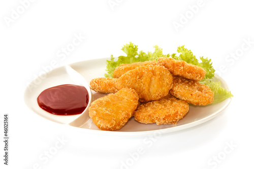 Photo: Plate of nuggets with dip sauce Plate of nuggets with dip sauce