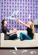 two girls scatter Russian rubles