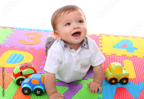 Photo: Cute Boy Playing with Toys Cute Boy Playing with Toys