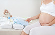 Photo: Pregnant woman is getting ready for the maternity hospital Pregnant woman is getting ready for the maternity hospital