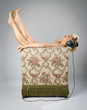 Foto: Woman listening to music in chair Woman listening to music in chair
