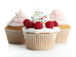 tasty cupcakes with berries, isolated on white