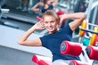 Woman at the gym exercising