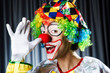Funny clown in the studio shooting