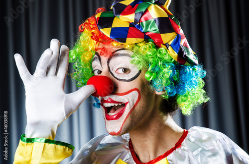 Photo: Funny clown in the studio shooting Funny clown in the studio shooting