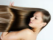  beautiful young woman with elegant long shiny hair , hairstyle