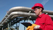 Oil Refinery Worker in Red Overalls
