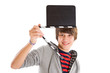 Junge mit Filmklappe in der Hand