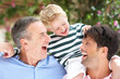 Photo: Grandfather And Father Giving Grandson Ride On Shoulders Grandfather And Father Giving Grandson Ride On Shoulders