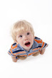 Adorable  blonde hair baby boy screaming and crying