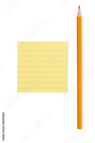 Photo: Sharp pencil and yellow post-it note Sharp pencil and yellow post-it note