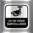 Video surveillance symbol on a metallic chromium background