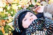 pretty woman lying on a meadow