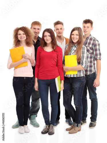 Photo: Casual group of excited friends isolated on white Casual group of excited friends isolated on white