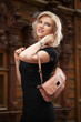 Happy young woman in black dress
