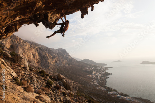 Fototapeta Rock climber at sunset, Kalymnos Island, Greece