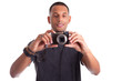 Portrait of a young african american man holding and taking a pi