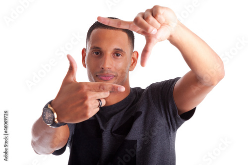 Photo: African american man making frame sign with his hands African american man making frame sign with his hands