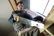 Man sawing wood