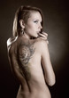 Girl with tattoos and piercings