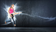 Photo: young woman playing on electro guitar and jumping young woman playing on electro guitar and jumping