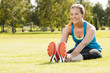 Happy woman jogger training in the park. Healthy lifestyle and p