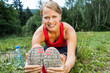 Woman runner exercising and stretching, summer nature outdoors