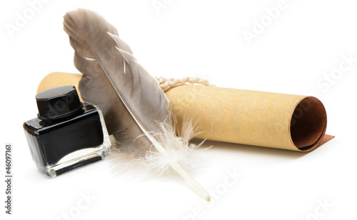Photo: A feather pen, ink,rolls of old yellowed paper A feather pen, ink,rolls of old yellowed paper