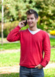 Young man communicating on smartphone