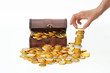 Pile up chocolate candy euro coins, a treasure chest