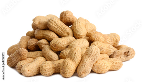 Photo: tasty peanuts, isolated on white tasty peanuts, isolated on white