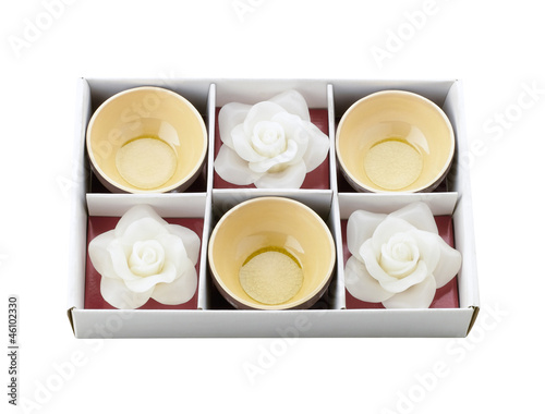 Photo: Tea cups and white flower candle storage in the box as a special Tea cups and white flower candle storage in the box as a special