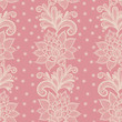 old white elegant doily on lace pink background.