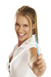 young woman showing teeth brush