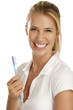 young woman showing teeth brush
