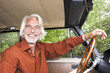 Foto: man in his car man in his car