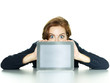 Business woman watching surprised over her tablet pc