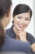 Asian Chinese Woman or Businesswoman in Meeting