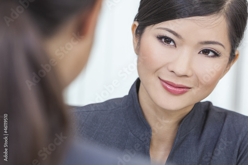 Photo: Asian Chinese Woman or Businesswoman in Meeting Asian Chinese Woman or Businesswoman in Meeting
