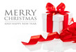 Photo: Gift with ribbon and bow isolated on the white background Gift with ribbon and bow isolated on the white background