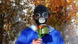Man in gas mask in fog