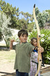 portrait of a child, archery, outdoor
