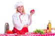 Photo: attractive woman cooks attractive woman cooks