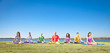 Foto: Group of young people have meditation Group of young people have meditation