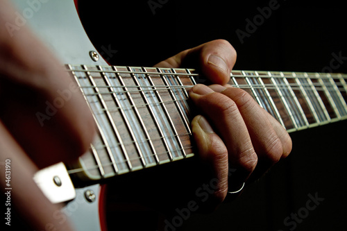 Photo: Playing the Guitar Playing the Guitar
