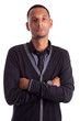 Portrait of a young african american man with folded arms