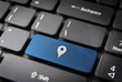 Blue geo location keyboard key, technology background