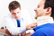 Doctor examining a patient