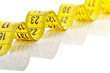 Whirled yellow tape measure